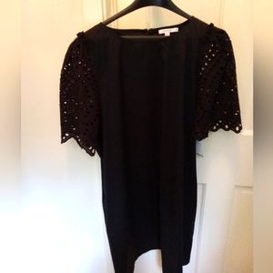 NEW.  CHICO'S ELEGANT BLACK DRESS WITH GORGEOUS EYELET SLEEVES.  CHICO'S SIZE 2